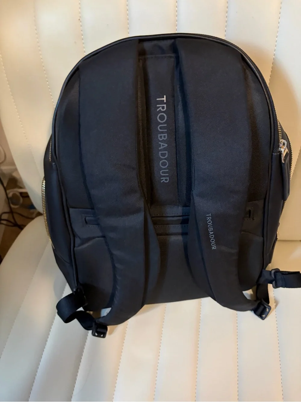 Sophisticated Black Women's Backpack with Gold Hardware